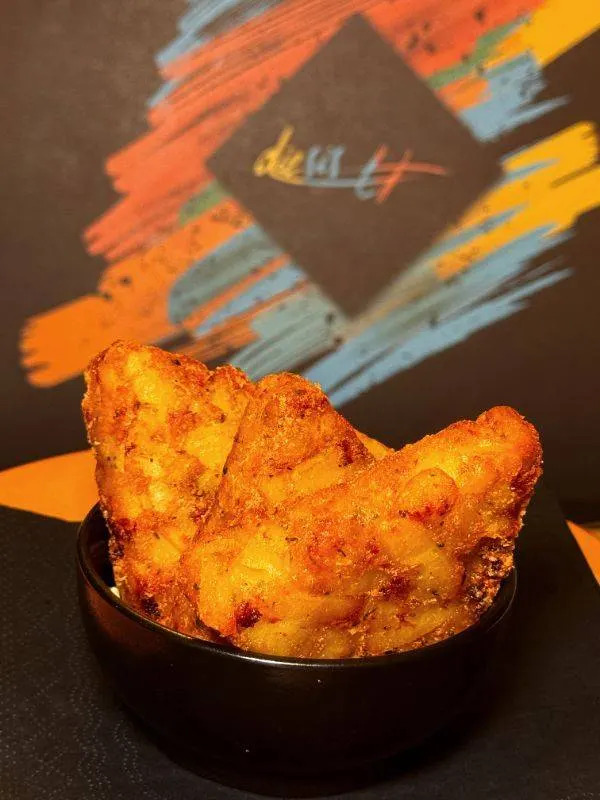 Triangolini di patate e speck